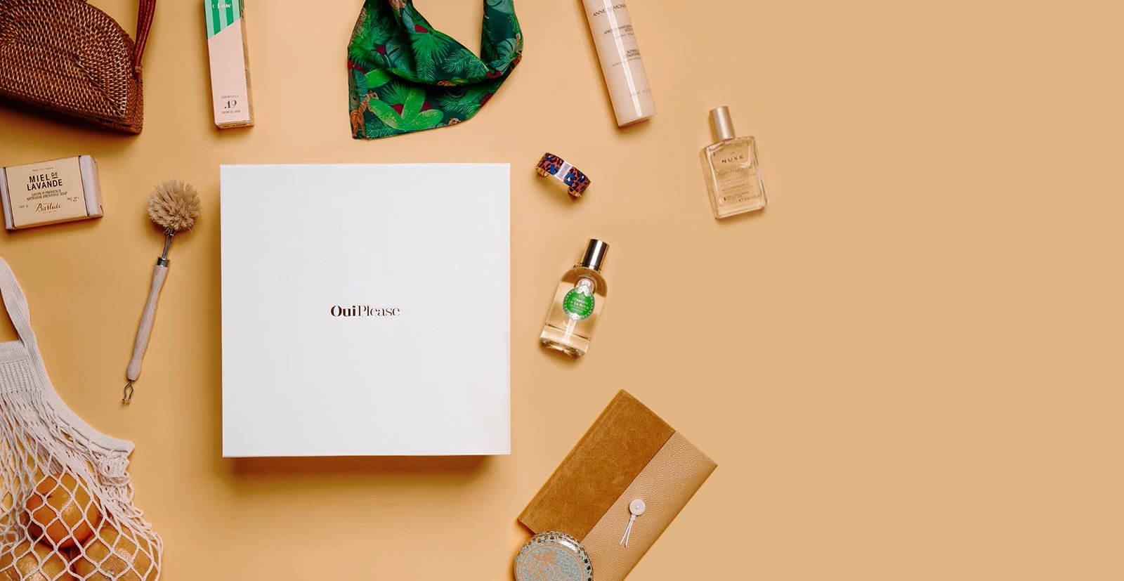 sliders-OP4 Open OuiPlease box orange background displaying products side centered